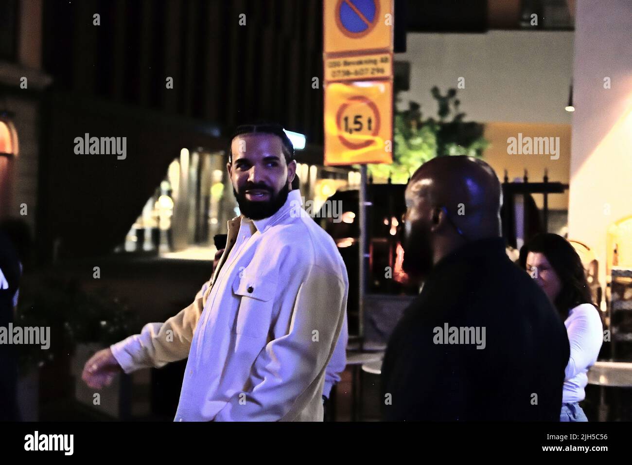*CAPTION CORRECTION* Artist Drake with entourage on Biblioteksgatan, Stockholm, Sweden 13 July 2022 Photo: Lars Hoglund / TT / Code 2884  EXCLUSIVE Stock Photo