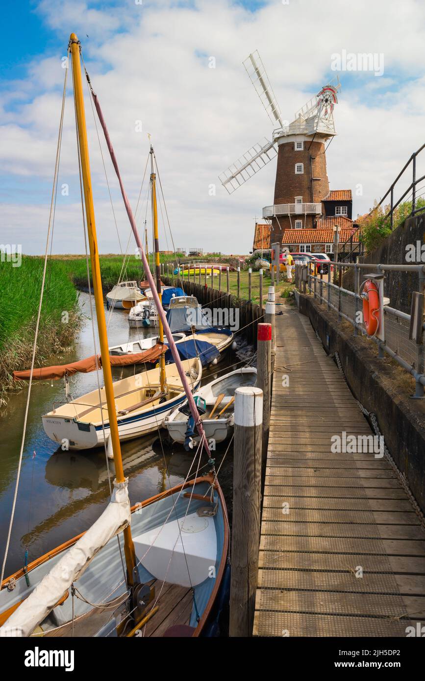 Cley next the Sea, view in summer of the scenic quay with its historic 18th century windmill in Cley next the Sea on the north Norfolk coast, England Stock Photo