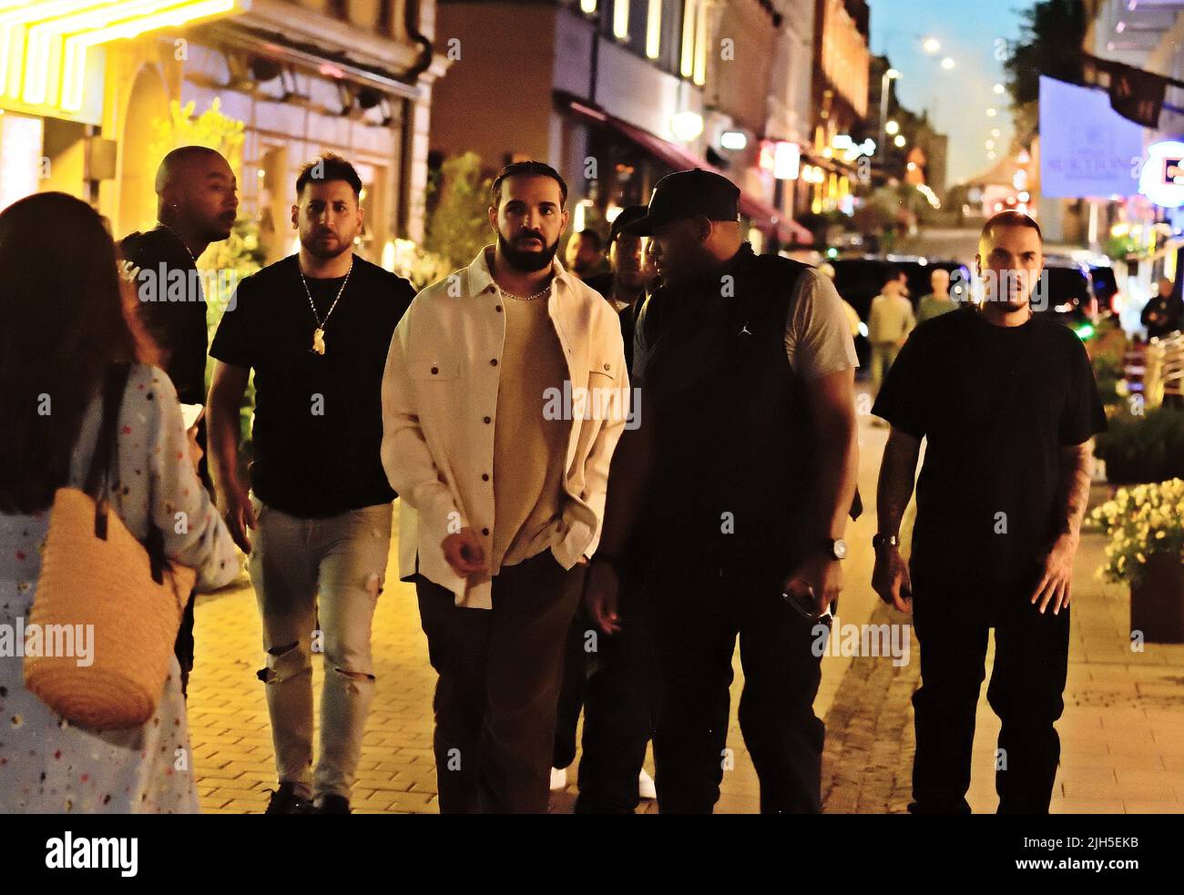 *CAPTION CORRECTION* Artist Drake with entourage on Biblioteksgatan, Stockholm, Sweden 13 July 2022 Photo: Lars Hoglund / TT / Code 2884  EXCLUSIVE Stock Photo