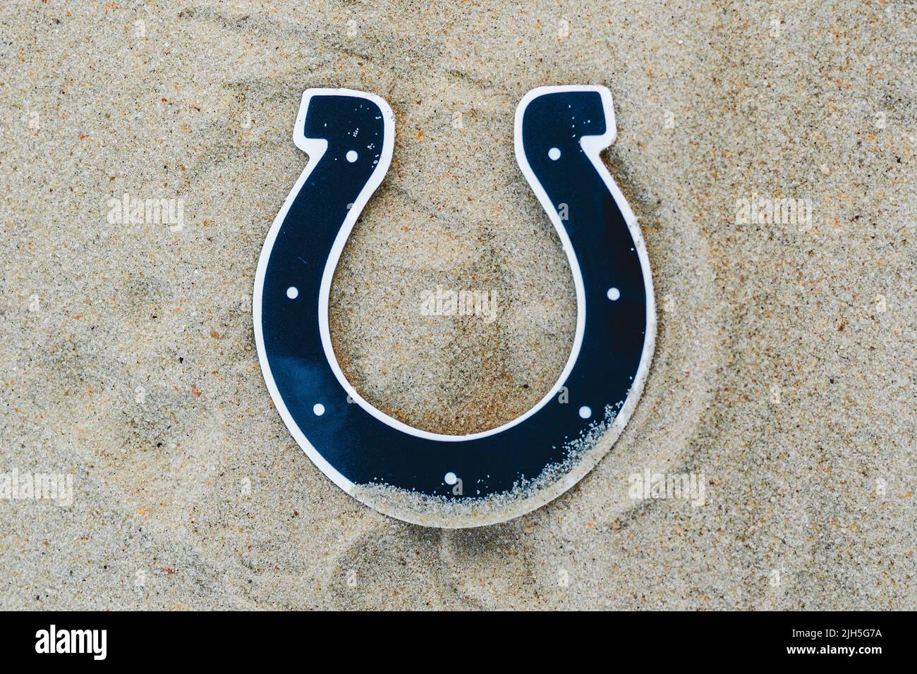 September 15, 2021, Moscow, Russia. The emblem of the Indianapolis Colts football club on the sand of the beach. Stock Photo
