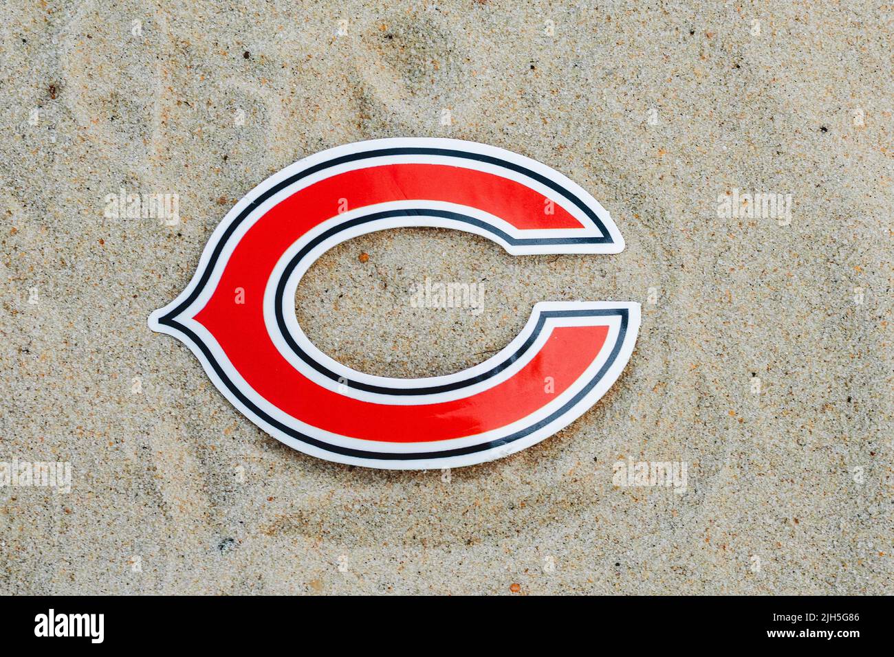 September 15, 2021, Moscow, Russia. The logo of the Chicago Bears football club on the sand of the beach. Stock Photo