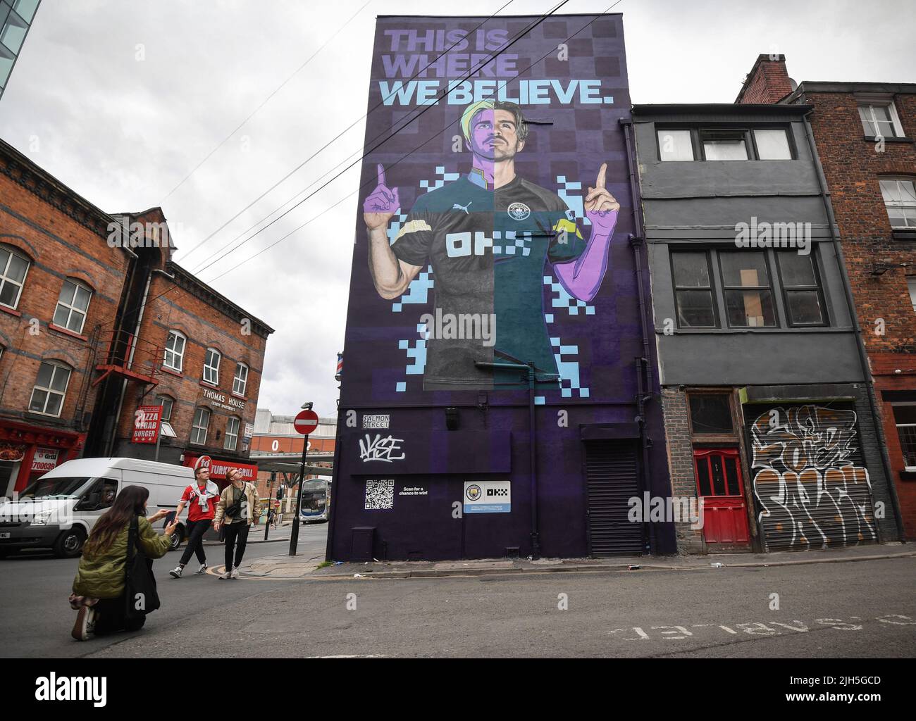 EDITORIAL USE ONLY A Cyber-Punk mural of Manchester City FC star Jack Grealish by Akse P19 and Global Street Art Agency is unveiled in Manchester as crypto trading platform OKX celebrates becoming the Official Training Kit Partner of MCFC for the 2022/2023 season. Picture date: Friday July 15, 2022. Stock Photo