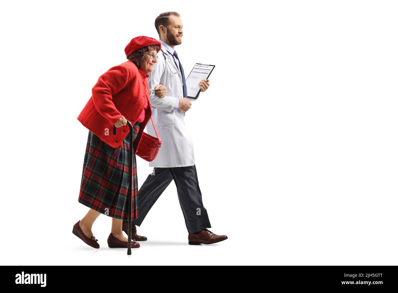 Full length profile shot of a senior woman walking and holding a doctor