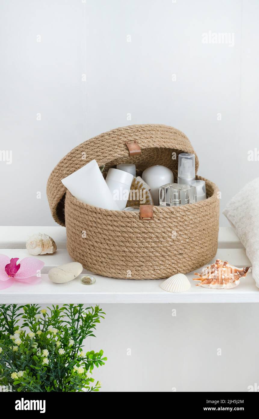 Hand knitted jute basket with a lid with accessories and cosmetics in ...