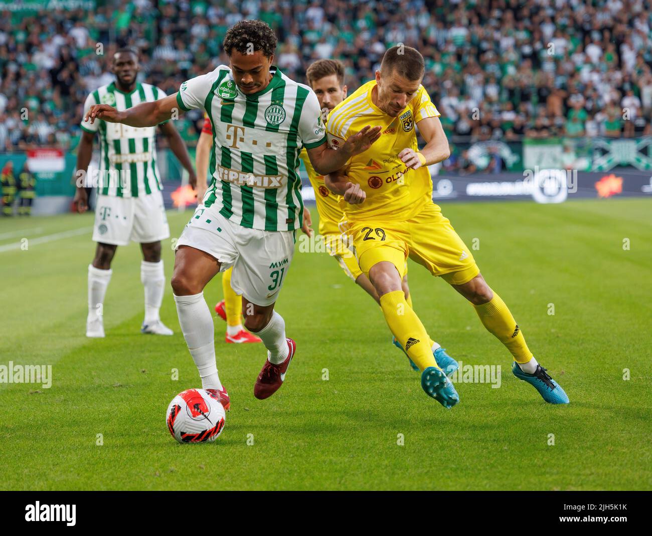 Zarko Tomasevic of FC Tobol challenges Samy Mmaee of Ferencvarosi TC  News Photo - Getty Images