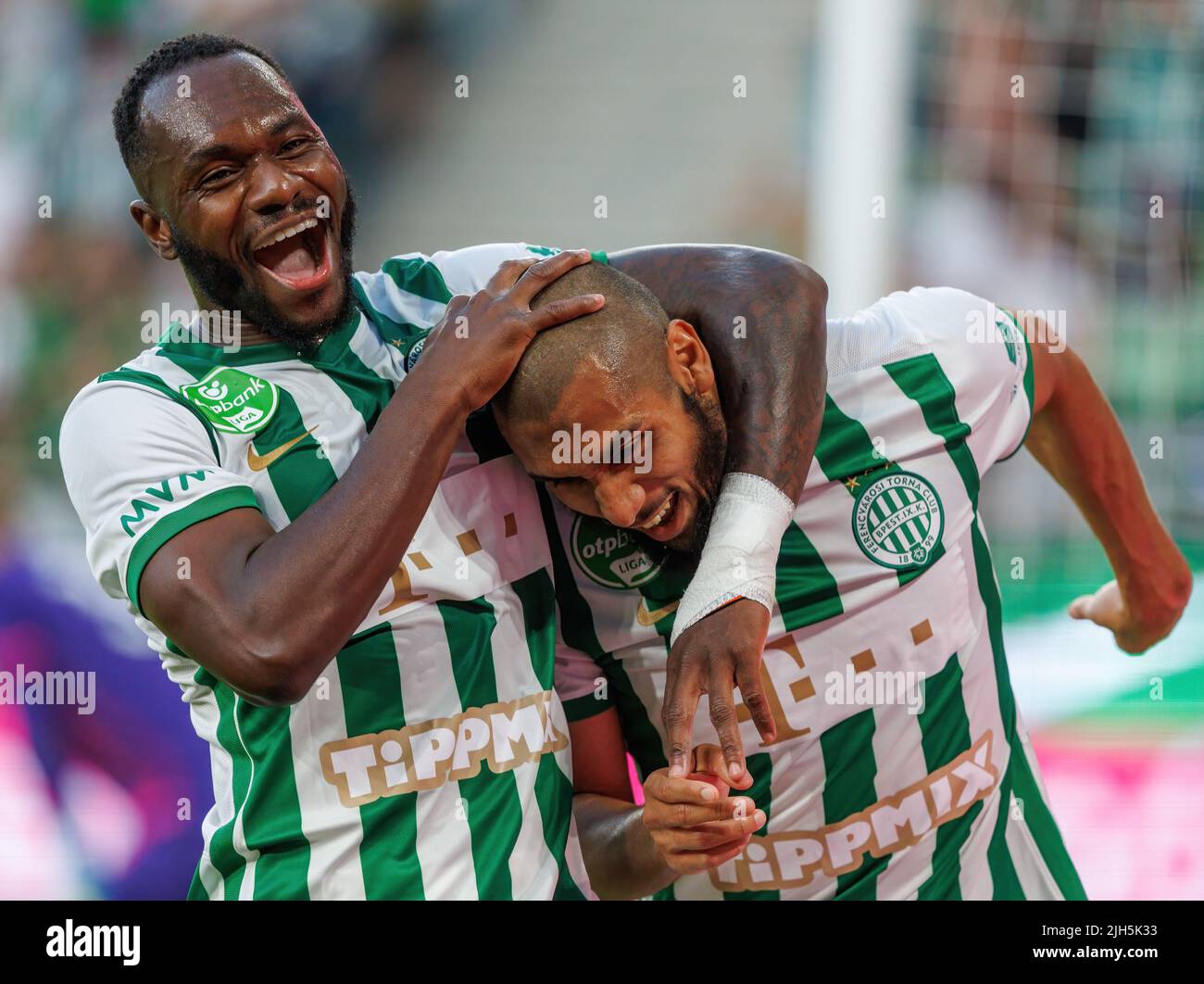 BUDAPEST, HUNGARY - JULY 13: Aissa Laidouni of Ferencvarosi TC celebrates after scoring a goal with Franck Boli of Ferencvarosi TC during the UEFA Champions League 2022/23 First Qualifying Round Second Leg match between Ferencvarosi TC and FC Tobol at Ferencvaros Stadium on July 13, 2022 in Budapest, Hungary. Stock Photo