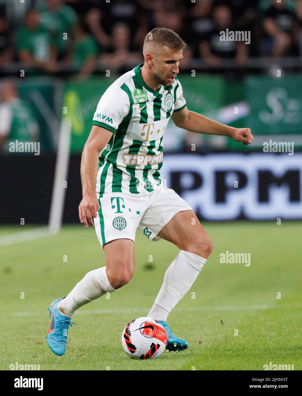 Zarko Tomasevic of FC Tobol challenges Samy Mmaee of Ferencvarosi TC  News Photo - Getty Images