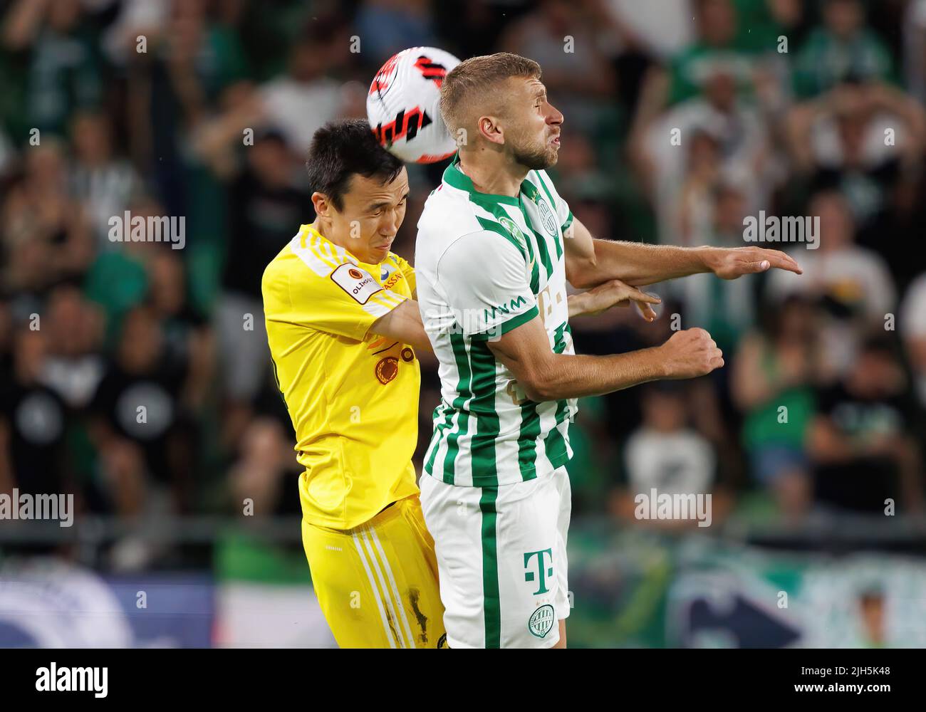 Zarko Tomasevic of FC Tobol challenges Samy Mmaee of Ferencvarosi TC  News Photo - Getty Images