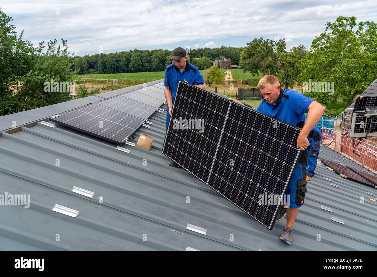 Installation of solar modules on the roof of a barn, a farm, over 240 ...