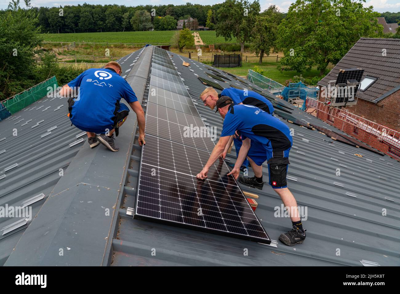 Installation of solar modules on the roof of a barn, a farm, over 240 ...