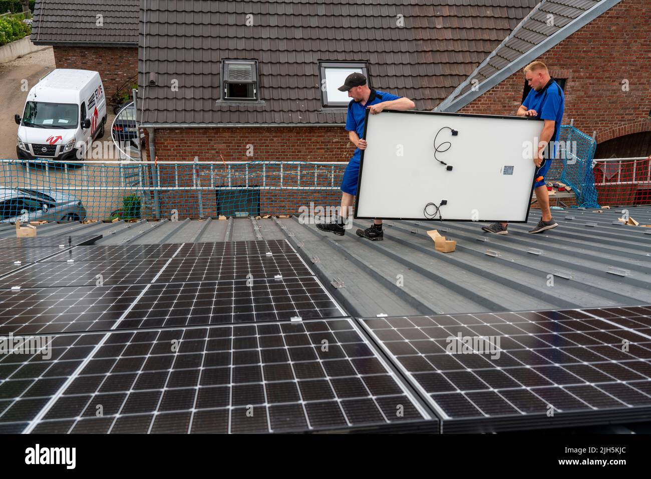 Installation of solar modules on the roof of a barn, a farm, over 240 ...