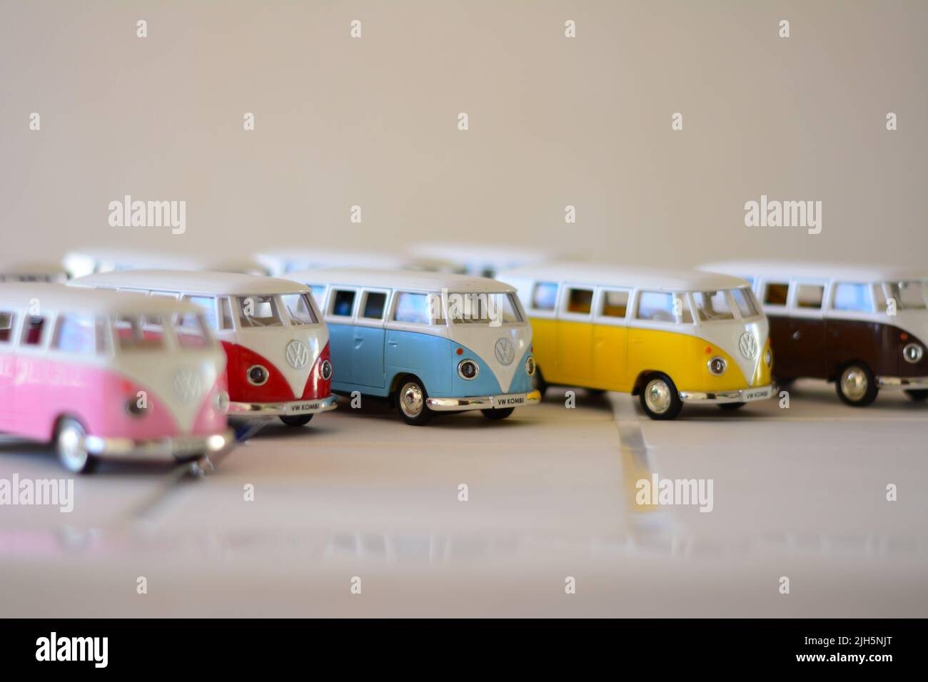 Iron miniature, Diecast, van in various colors, Brazil, South America, side view, selective focus, white background, intentionally cropped, intentiona Stock Photo