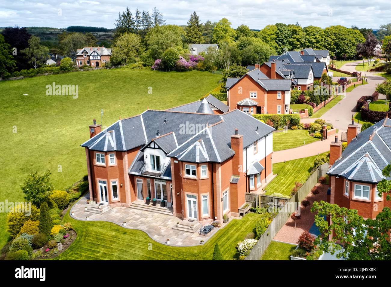 Luxury countryside rural village aerial view from above in Quarriers