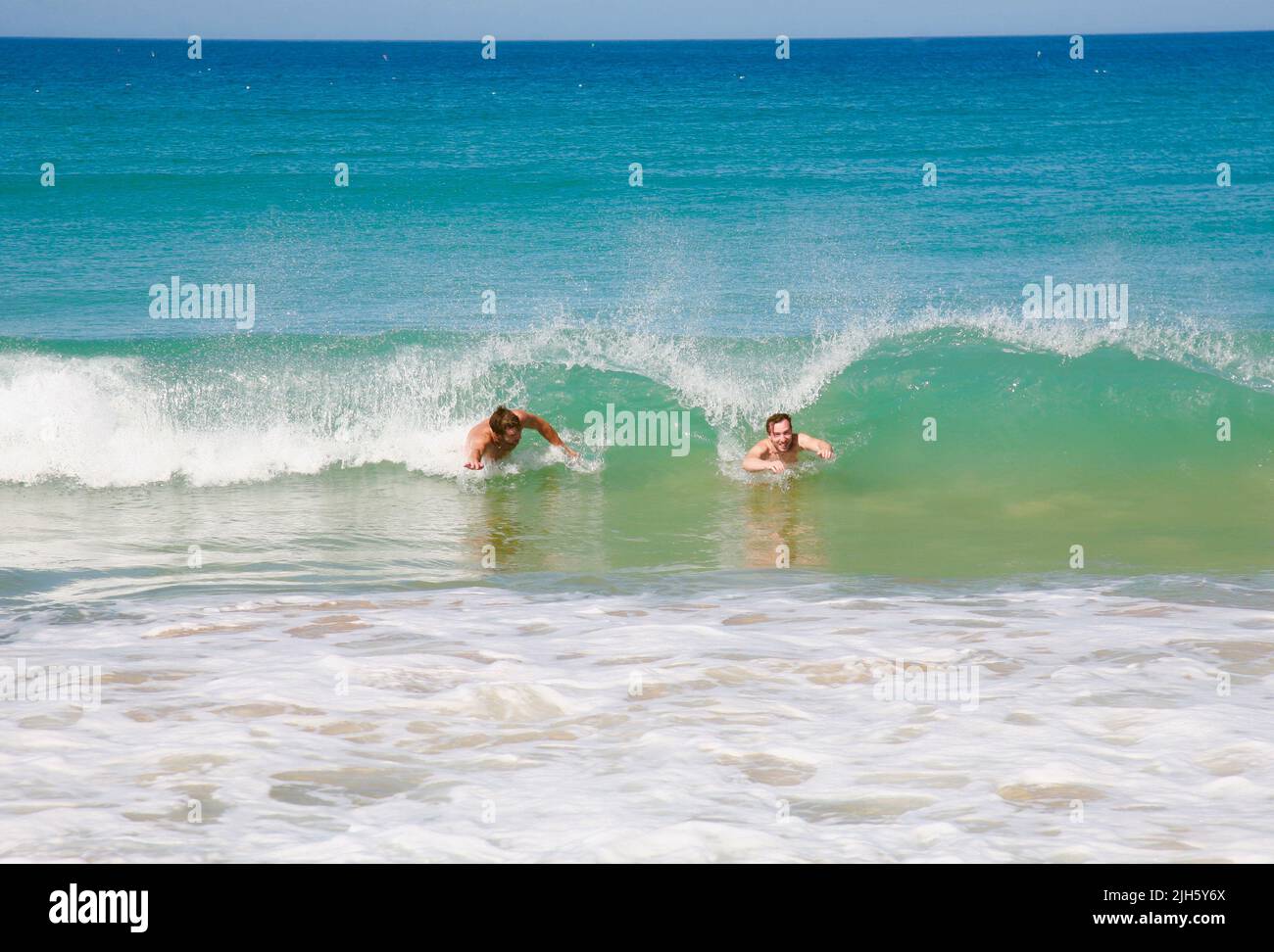 Crashing through the surf at Surtainville, Normandy, France, Europe Stock Photo