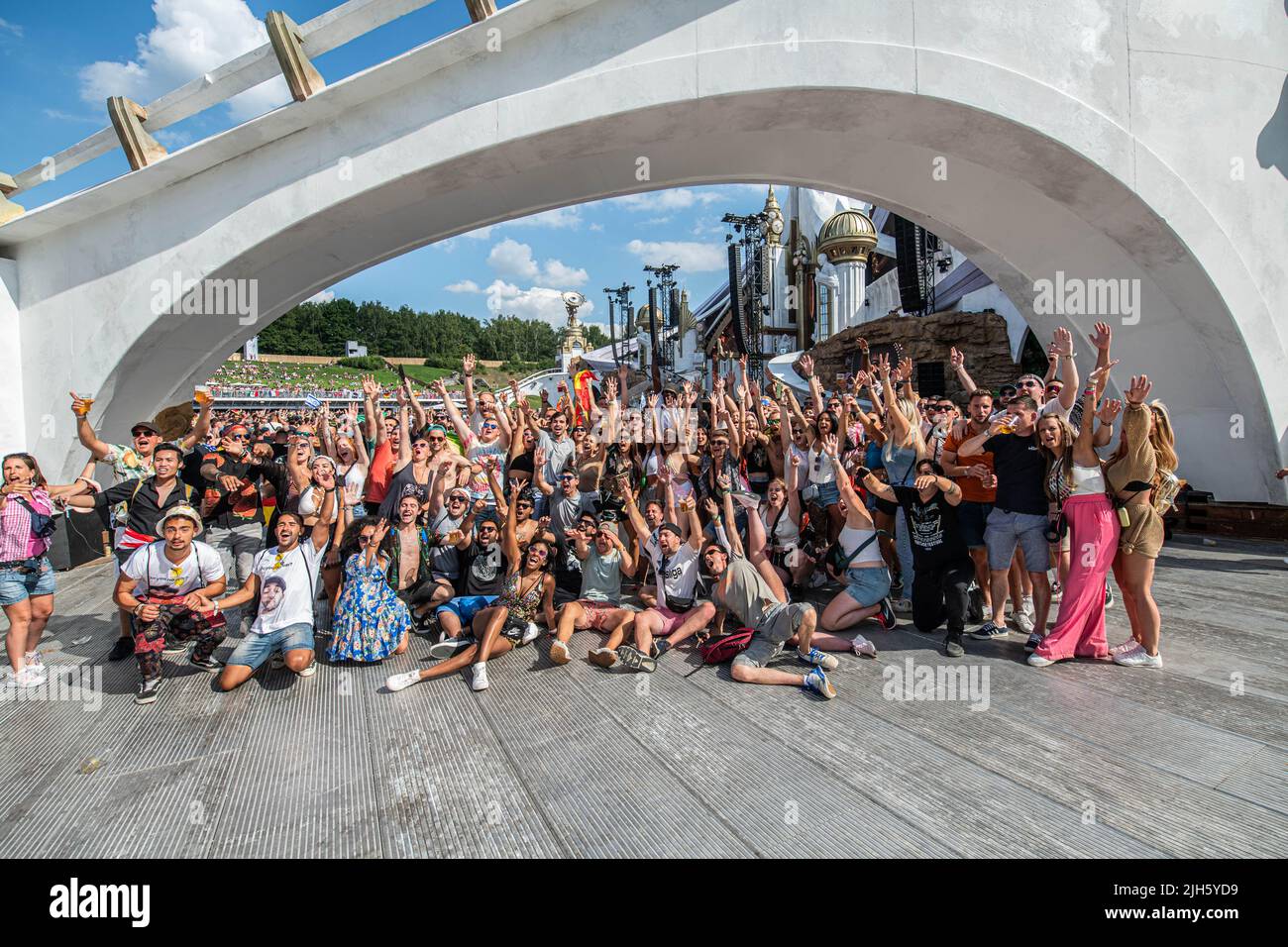 Boom, Belgium. 15th July, 2022. A group of festival goers poses for the photographer during the first day of the Tomorrowland electronic music festival, Friday 15 July 2022, in Boom. The 16th edition of the festival takes place on three weekends at the 'De Schorre' terrain in Boom, from 15 to 17 July, from 22 to 24 July 2022 and from 29 to 31 July. The festival had to be postponed for two years in the ongoing corona virus pandemic. BELGA PHOTO JONAS ROOSENS Credit: Belga News Agency/Alamy Live News Stock Photo