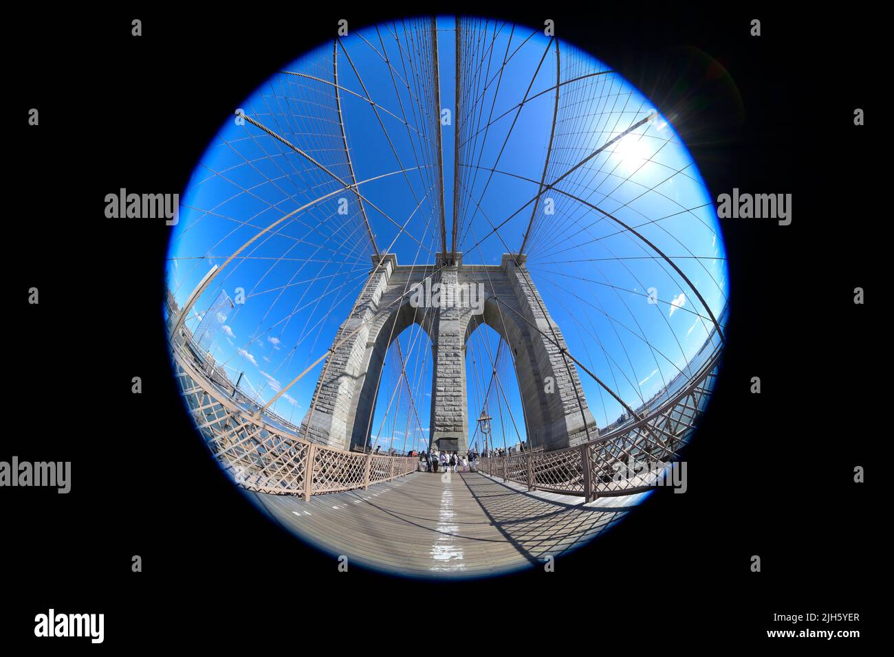 The iconic Brooklyn bridge on a crisp spring day, New York City NY