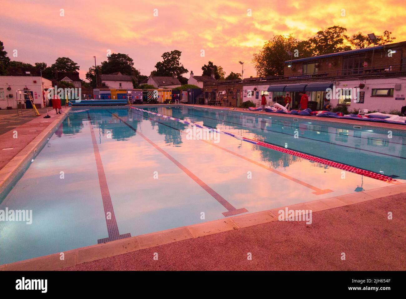 Hampton Open Air swimming pool on a warm and sunny evening with sunset