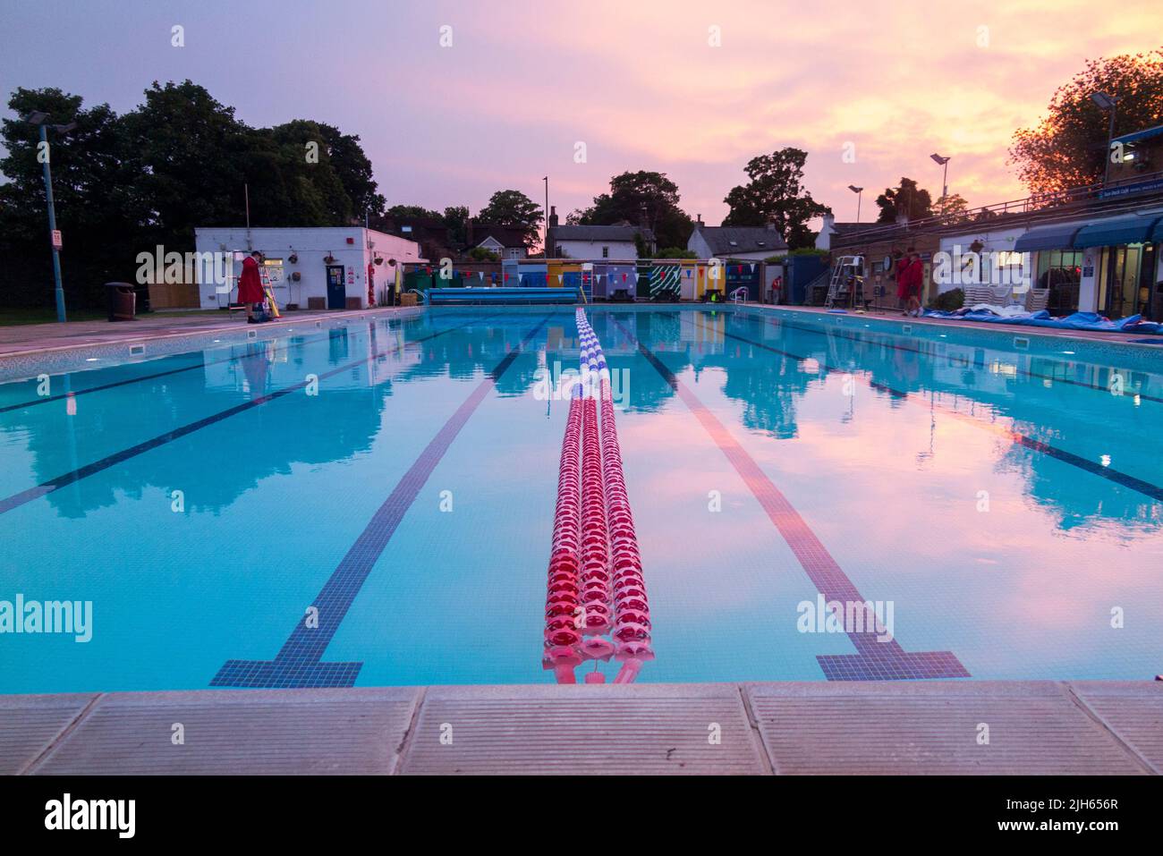 Hampton Open Air swimming pool on a warm and sunny evening with sunset