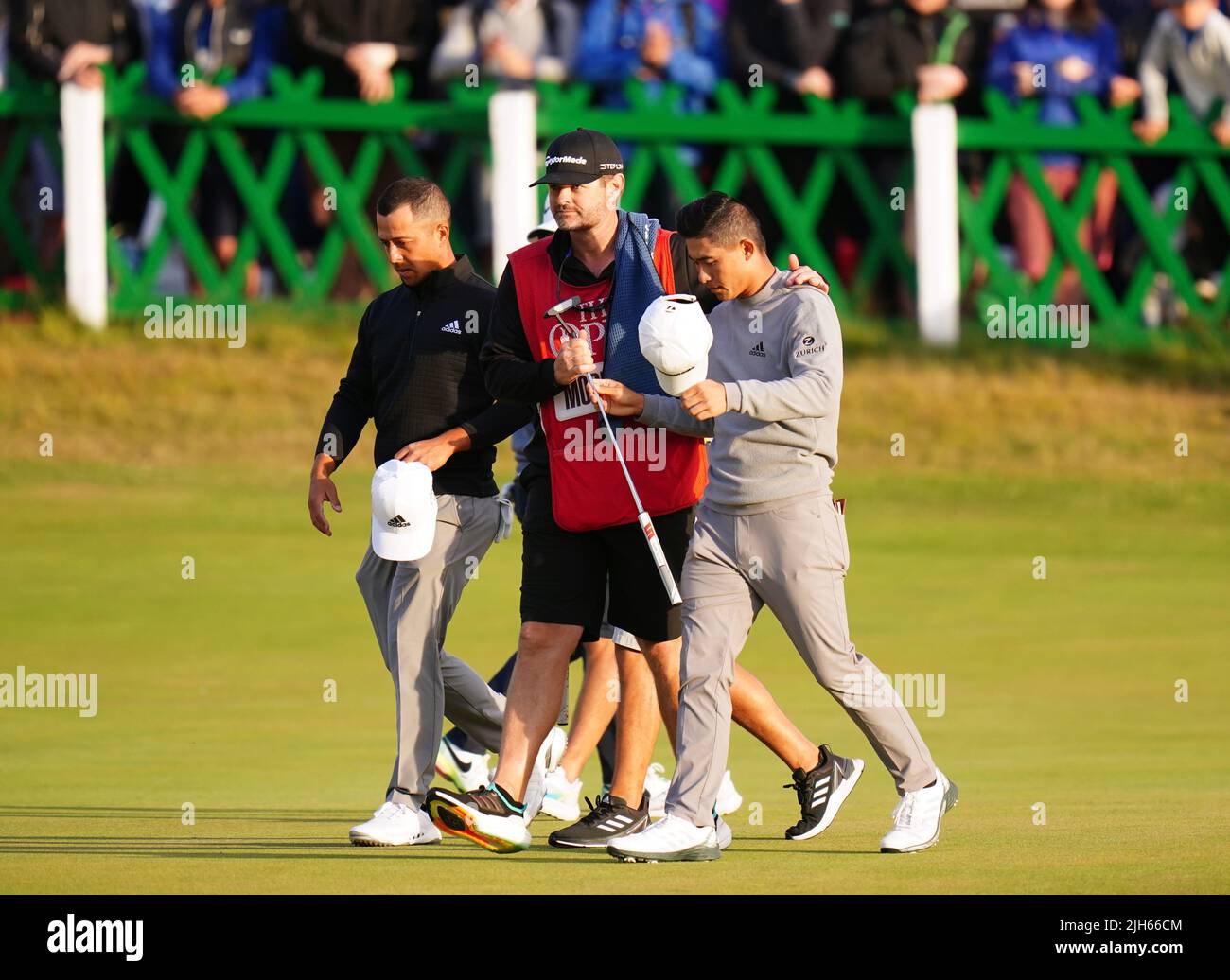 USA's Collin Morikawa walks off after his round on the 18th during day