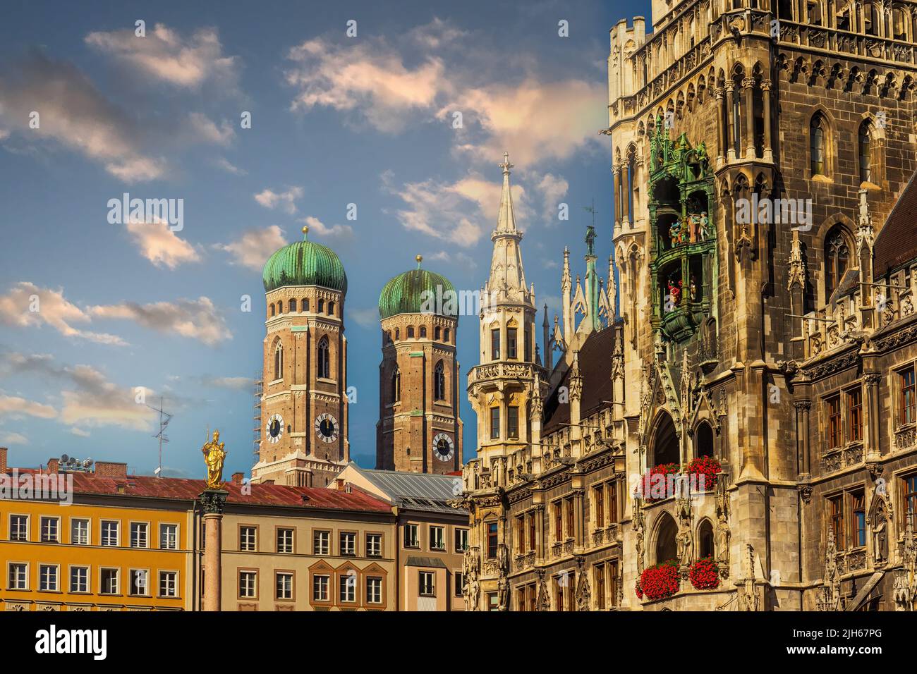 munich-sunset-with-frauenkirche-and-town-hall-on-marienplatz-stock