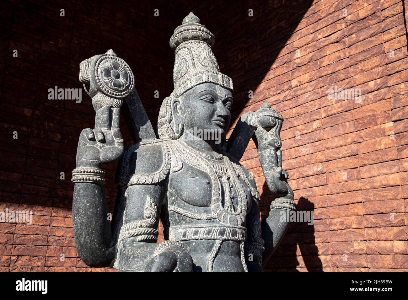 Statue of Hindu God Vishnu outside Asia and Pacific Museum (Muzeum Azji i Pacyfiku), Solec, Warsaw, Poland Stock Photo