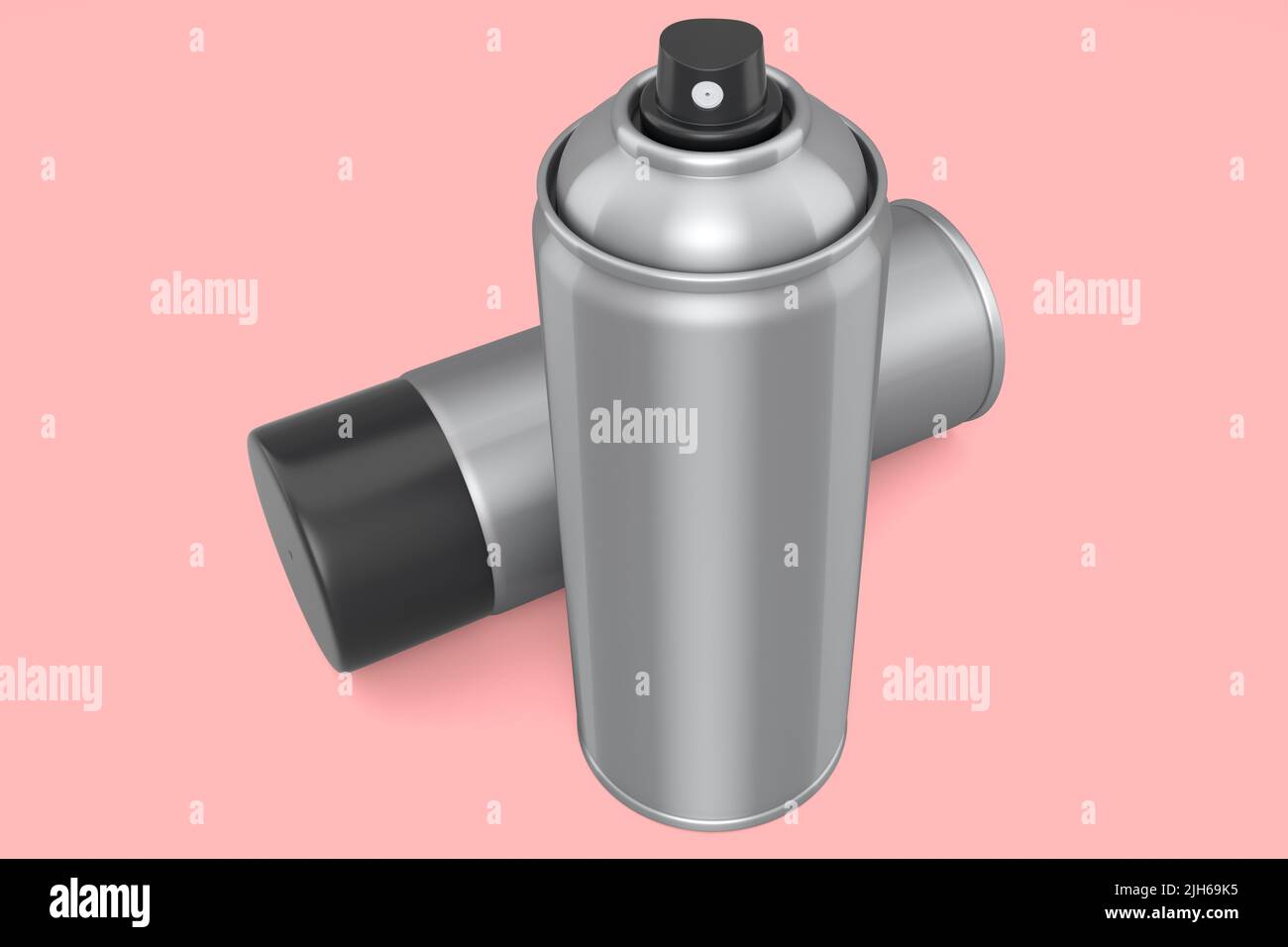 Cans of spray paint isolated on pink background. Spray bottle and