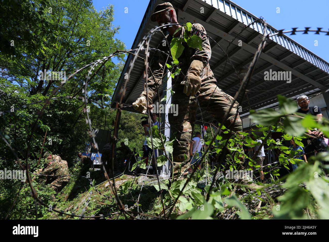 Slovenian army removes barbed wire fence on the Slovenian-Croatian border  crossing, in Krmacina, Slovenia, on July 15, 2022. Army will remove the 51  kilometres of barbed wire, after which the remaining 143
