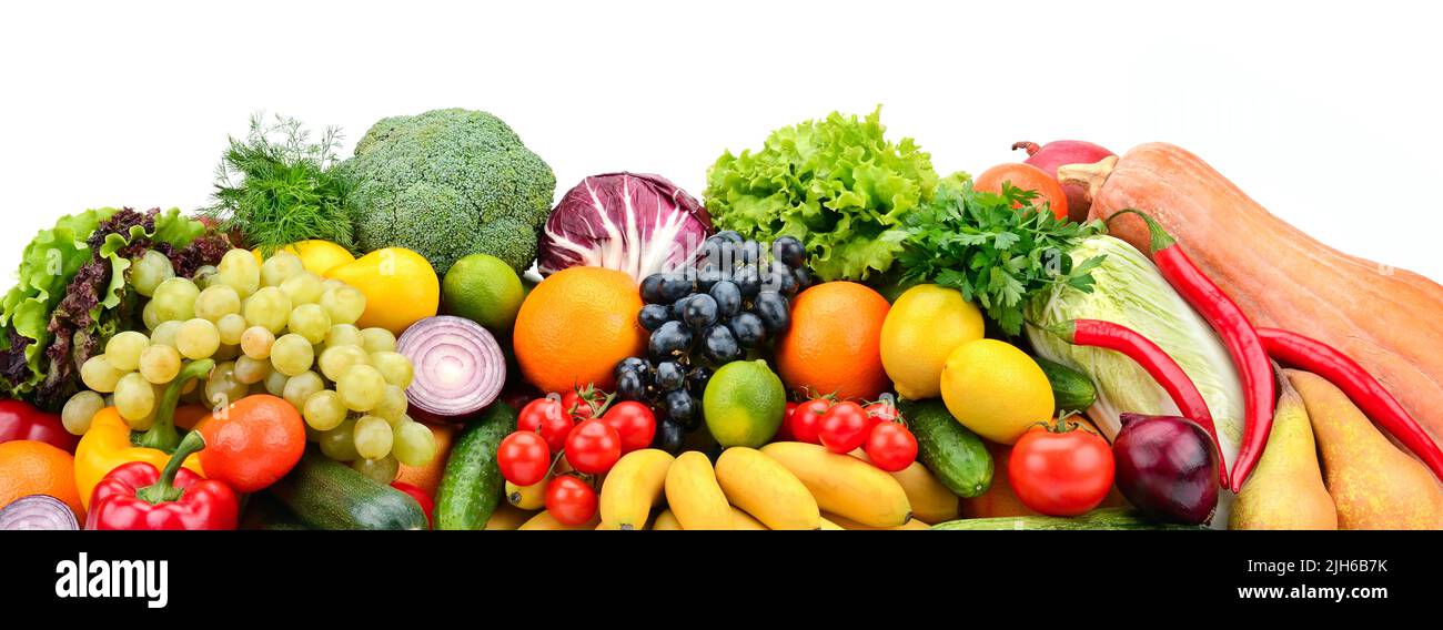 Heap different fruits, vegetables and berries isolated on white background Stock Photo