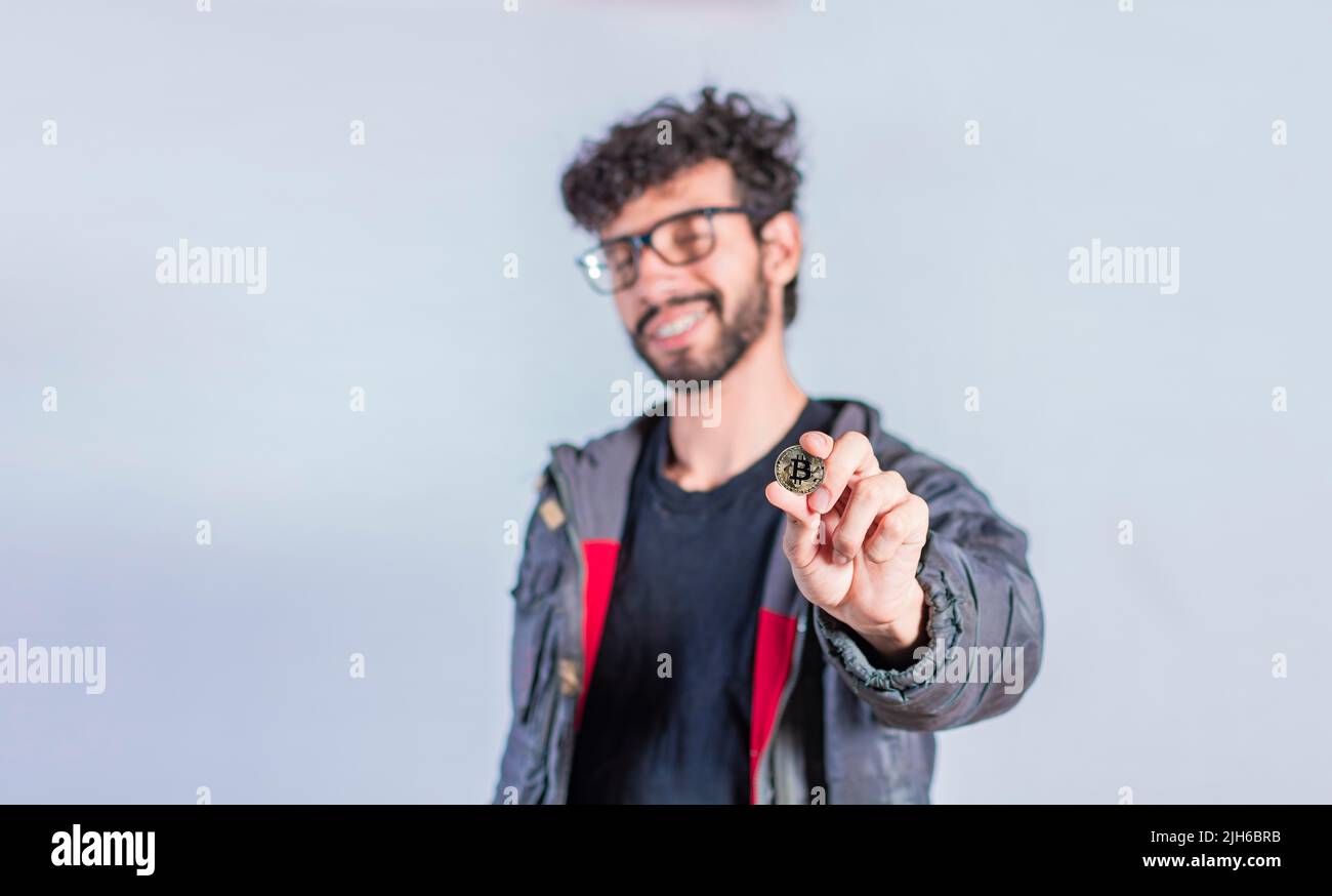 Person holding bitcoin hi-res stock photography and images - Alamy