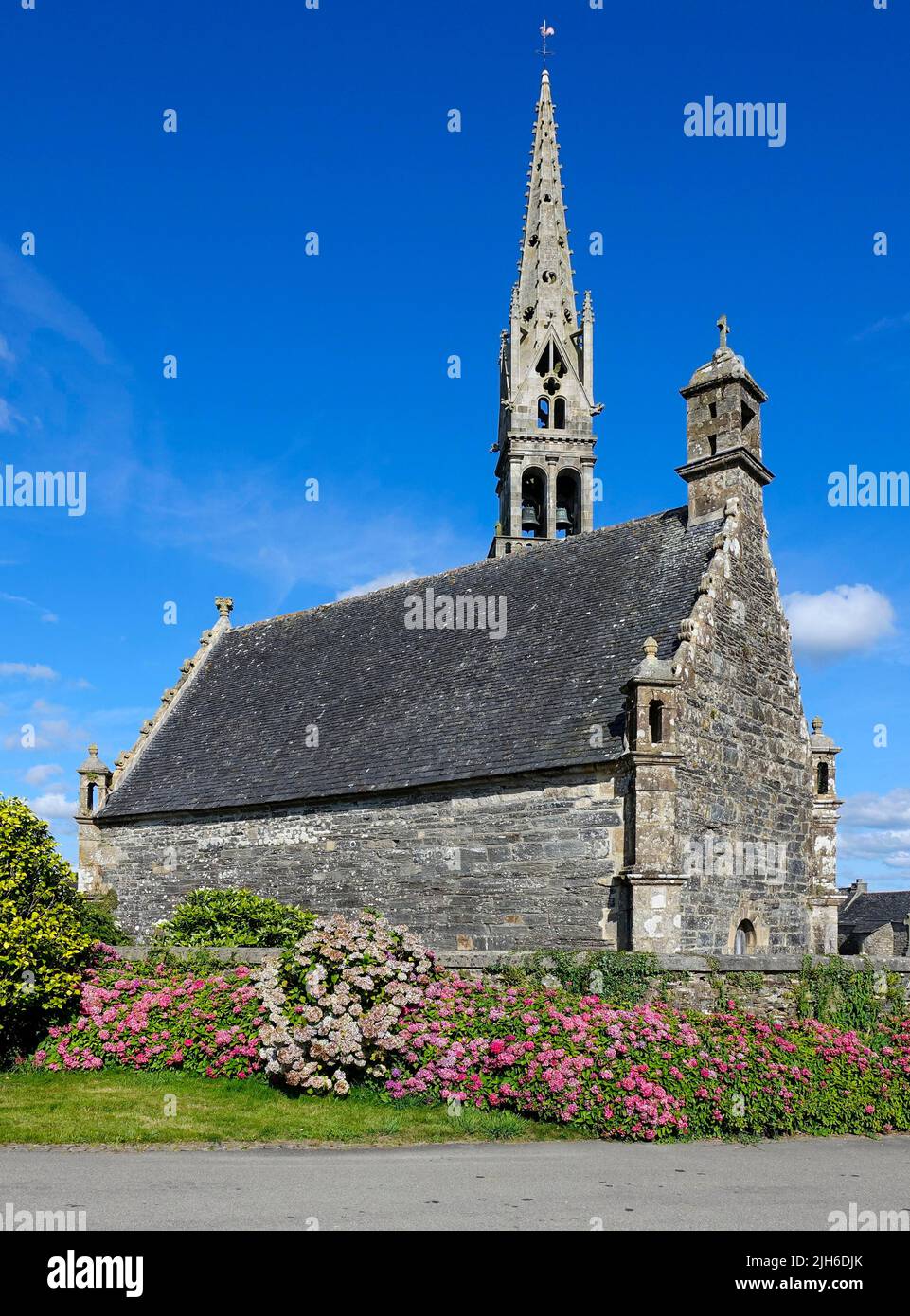 Enclosed parish Enclos paroissial with ossuary Ossuaire and church, Ploudiry, Finistere department, Brittany region, France Stock Photo