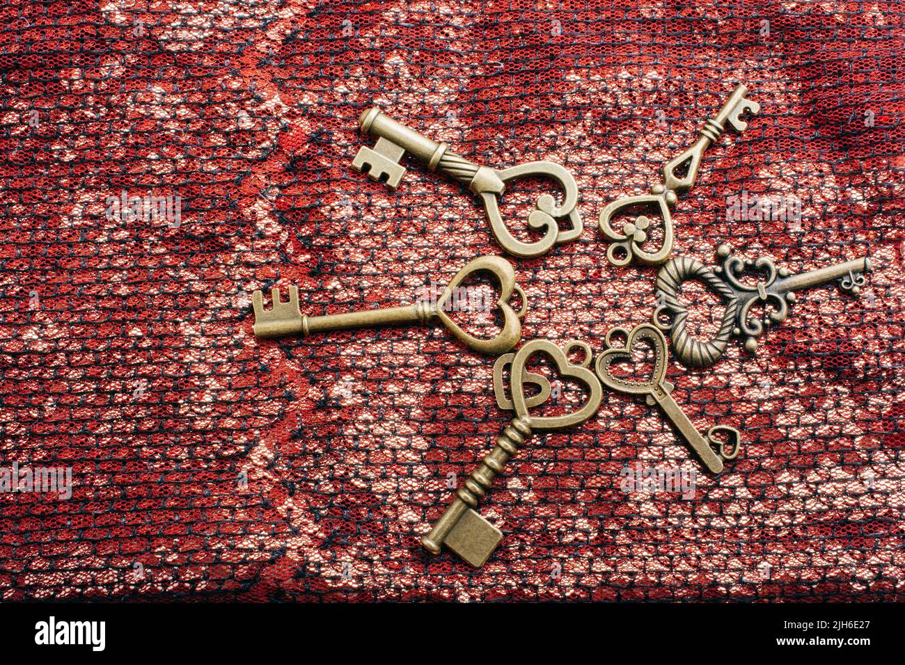Heart shaped retro metal keys on bright background Stock Photo - Alamy