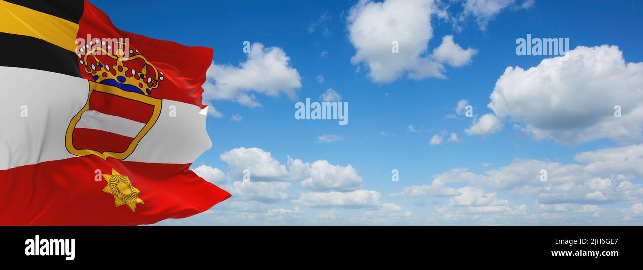 official flag of Habsburg Major General's Austria at cloudy sky background on sunset, panoramic