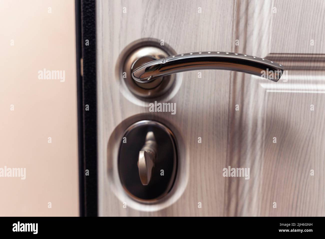 modern reliable metal door with wooden interior decor and triple seal