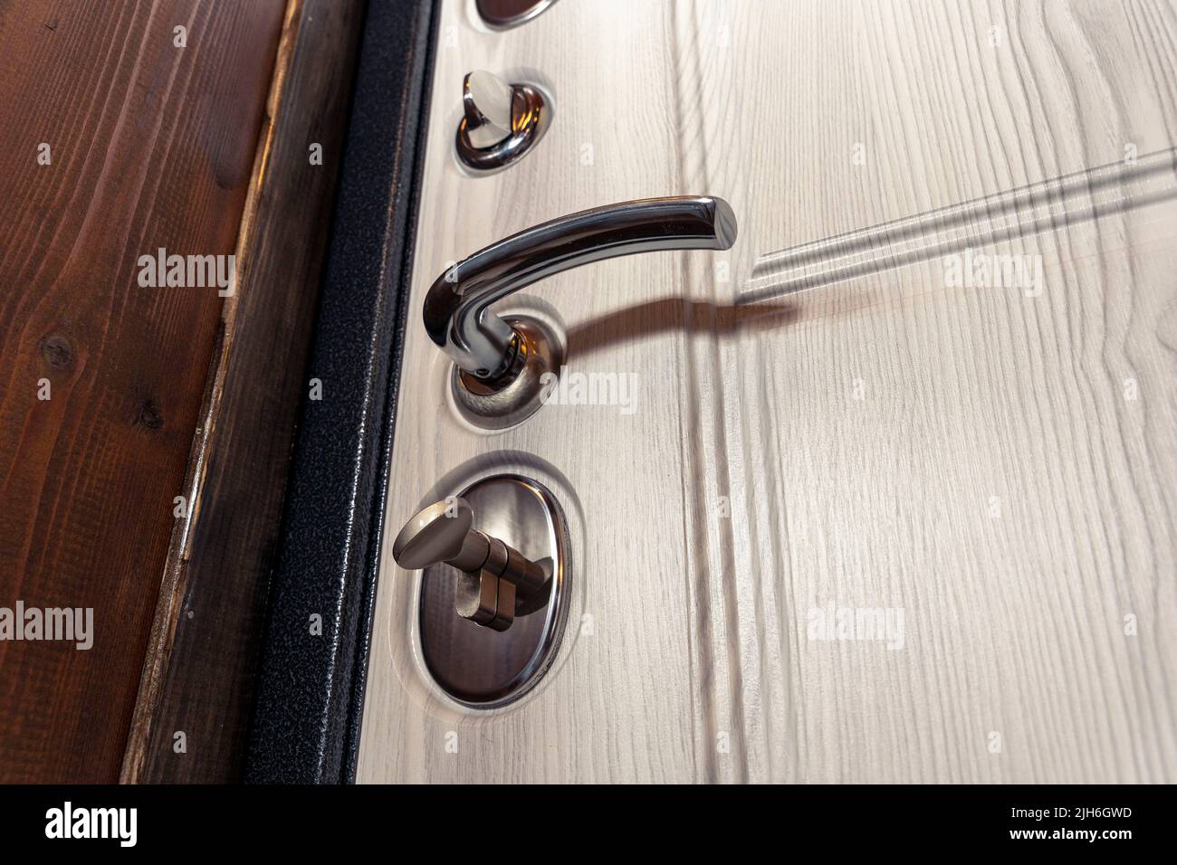 modern reliable metal door with wooden interior decor and triple seal