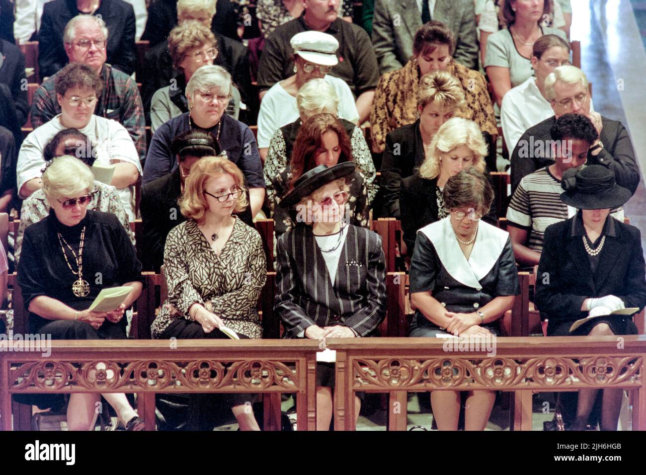 Members of the public gallery listen to the service during a memorial and prayer service to Diana, the Princess of Wales, on the occasion of her death at the Washington National Cathedral, September 6, 1997, in Washington, D.C. Stock Photo