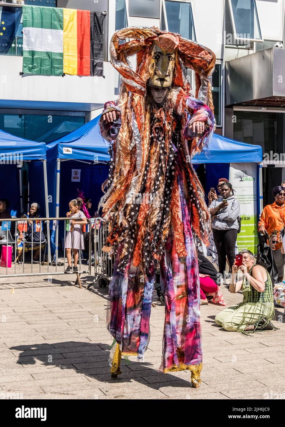 Masked Performers at Barking and Dagenham Carnival, summer 2022, East London, England, UK Stock Photo