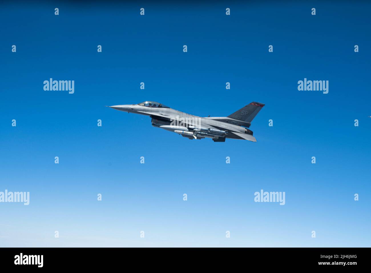 A U.S. Air Force F-16 Fighting Falcon assigned to the 480th Fighter Squadron, Spangdahlem Air Base, Germany, roams the skies above Spain during exercise Real Thaw 22, June 28, 2022. Real Thaw 22 is an annual multi-national training exercise held by the Portuguese air force that places its focus on maintaining ready and postured forces that are prepared to support combatant commander objectives. (U.S. Air Force photo by Senior Airman Nicholas Swift) Stock Photo