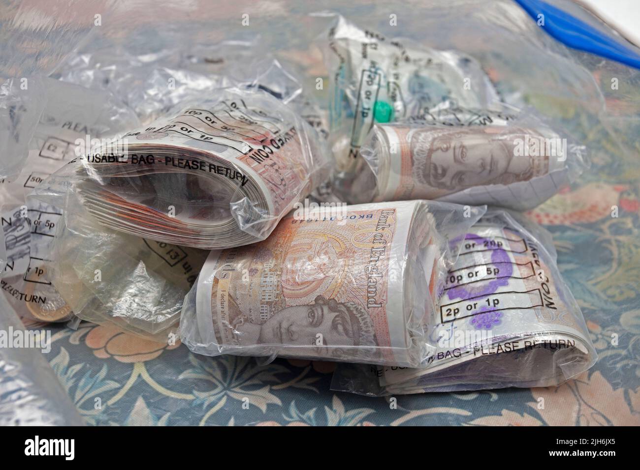 British bank notes in clear bags Stock Photo