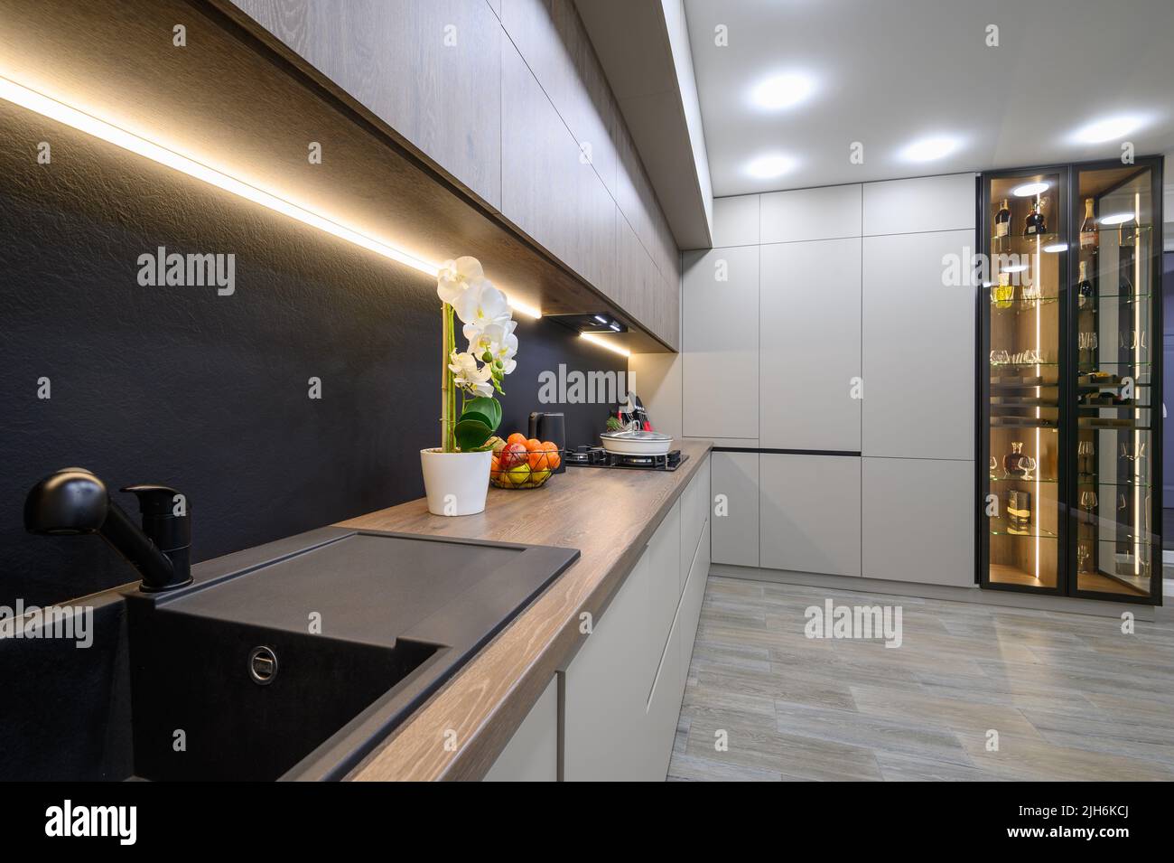 Trendy grey modern kitchen interior with minimalistic furniture Stock ...