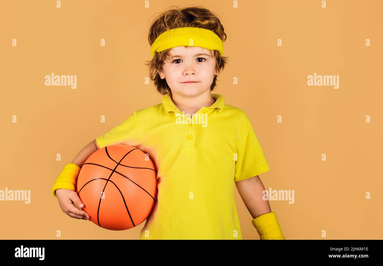 Child boy in sportswear with ball. Sport for children. Basketball player. Healthy lifestyle Stock Photo