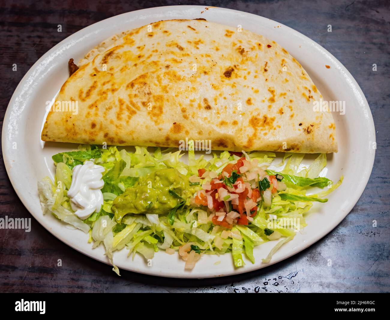 Close up shot of Mexician style beef taco with salad at Colorado Stock Photo