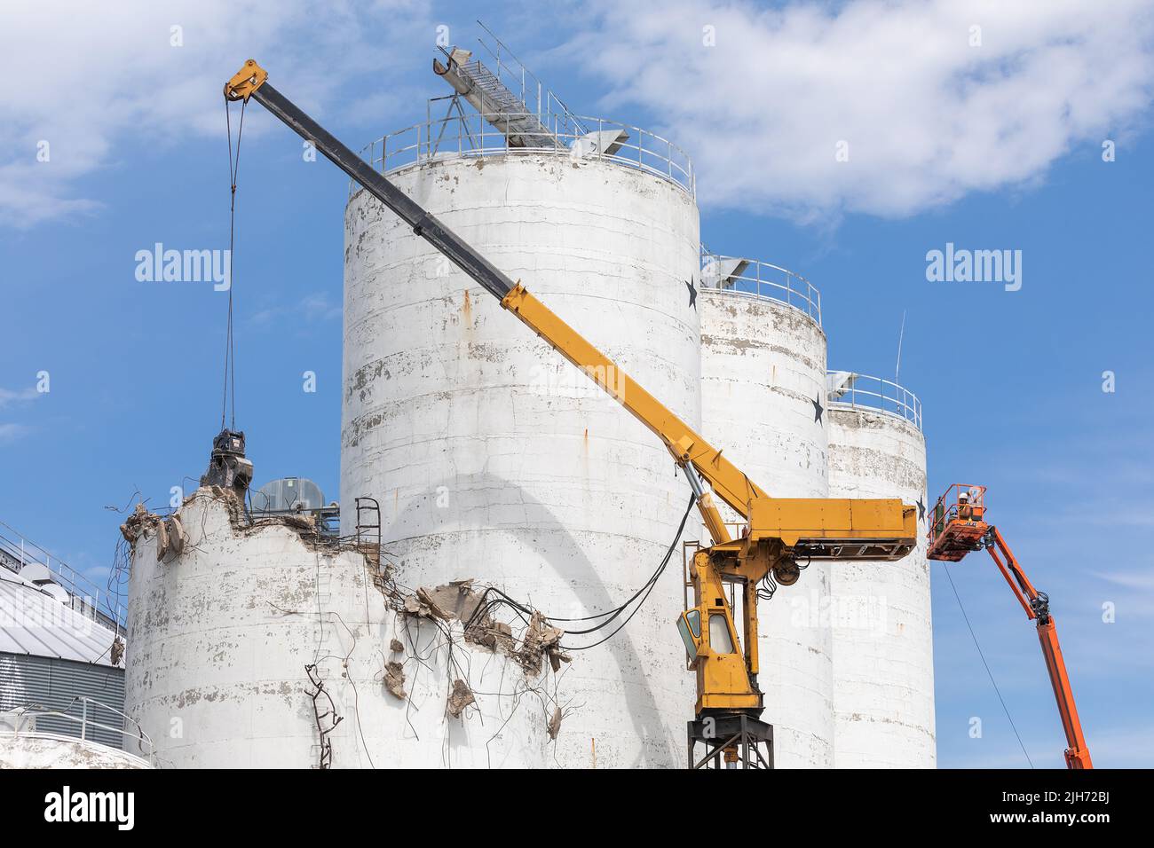 Demolition of concrete grain bins at the Agriway grain elevator in