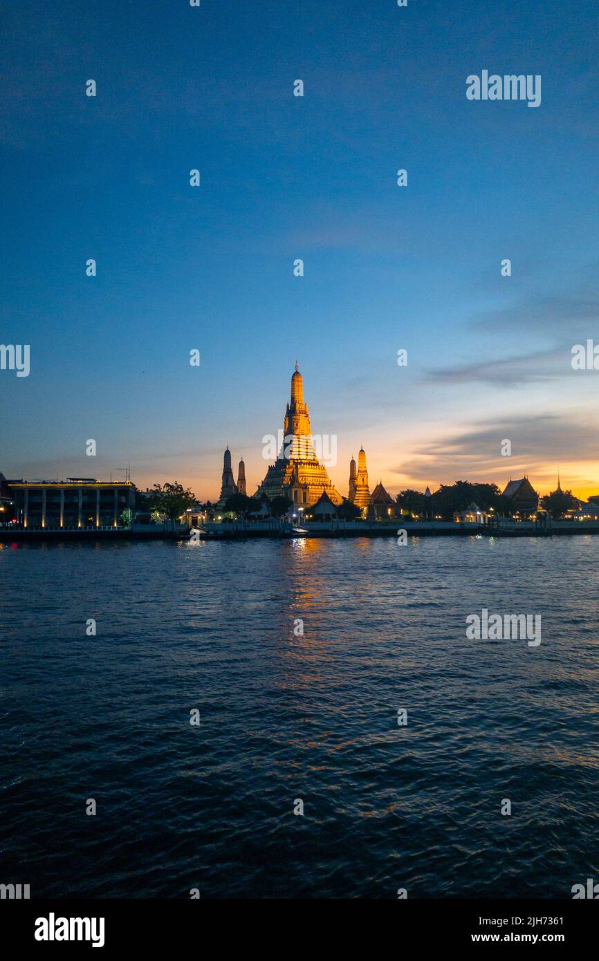 Sunset view at Wat Arun Temple near Chao Phraya river. Bangkok, Thailand. Stock Photo