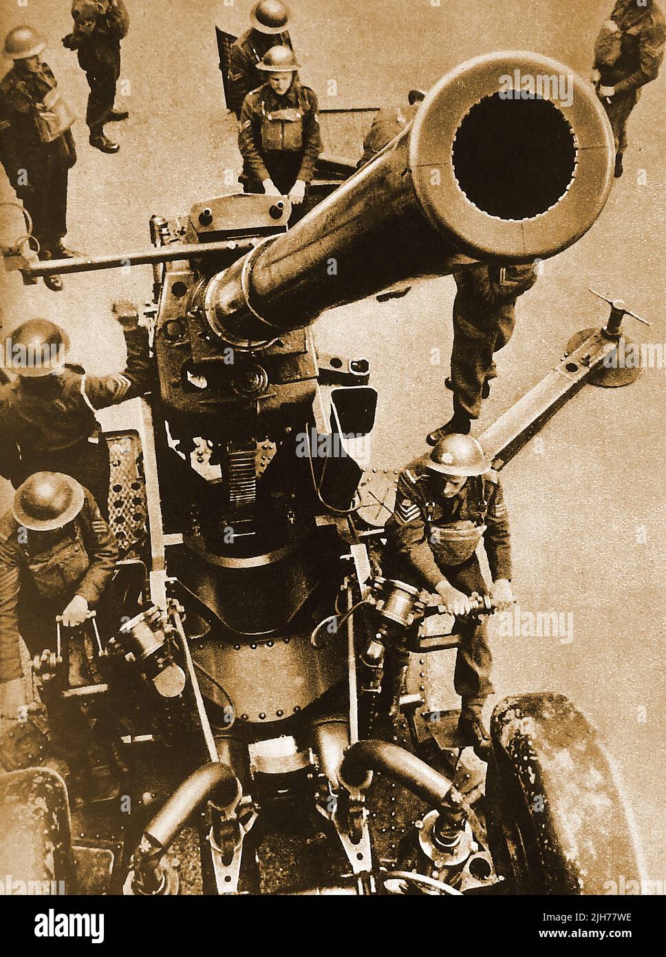 WWII. A British army A3 -7 gun anti aircraft detachment in action. Stock Photo