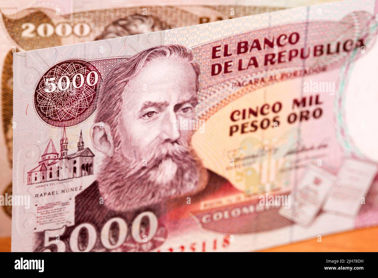 Old Colombian money - pesos a business background Stock Photo