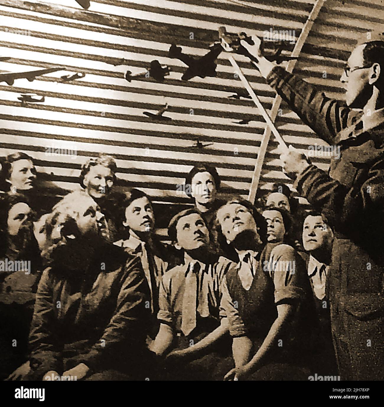 World war 2 , anti-aircraft precautions -- WWII - ATS girls learning aircraft recognition. Stock Photo