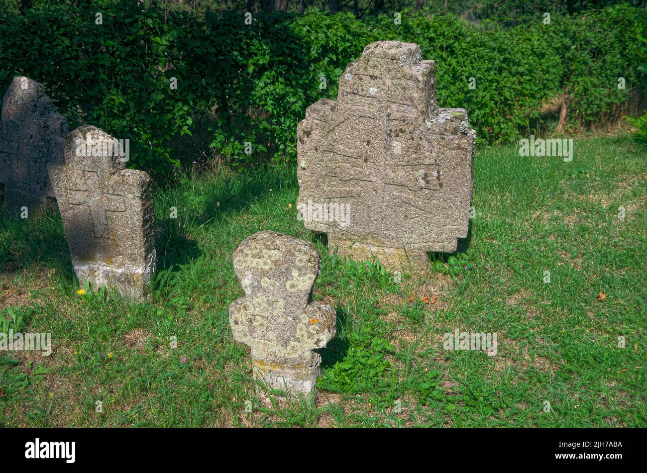 old gravestones in the Serbian Orthodox Monastery of Djurdjevi Stupovi in Serbia Stock Photo