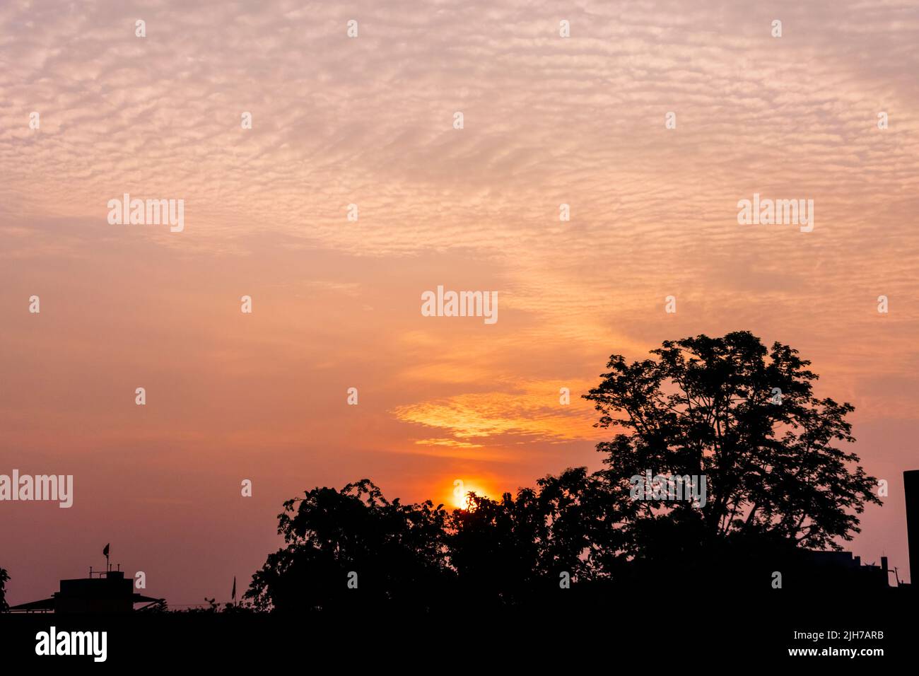 Incomparably amazing cloud formation in colourful sky during a monsoon sunrise morning in west Bengal, India Stock Photo