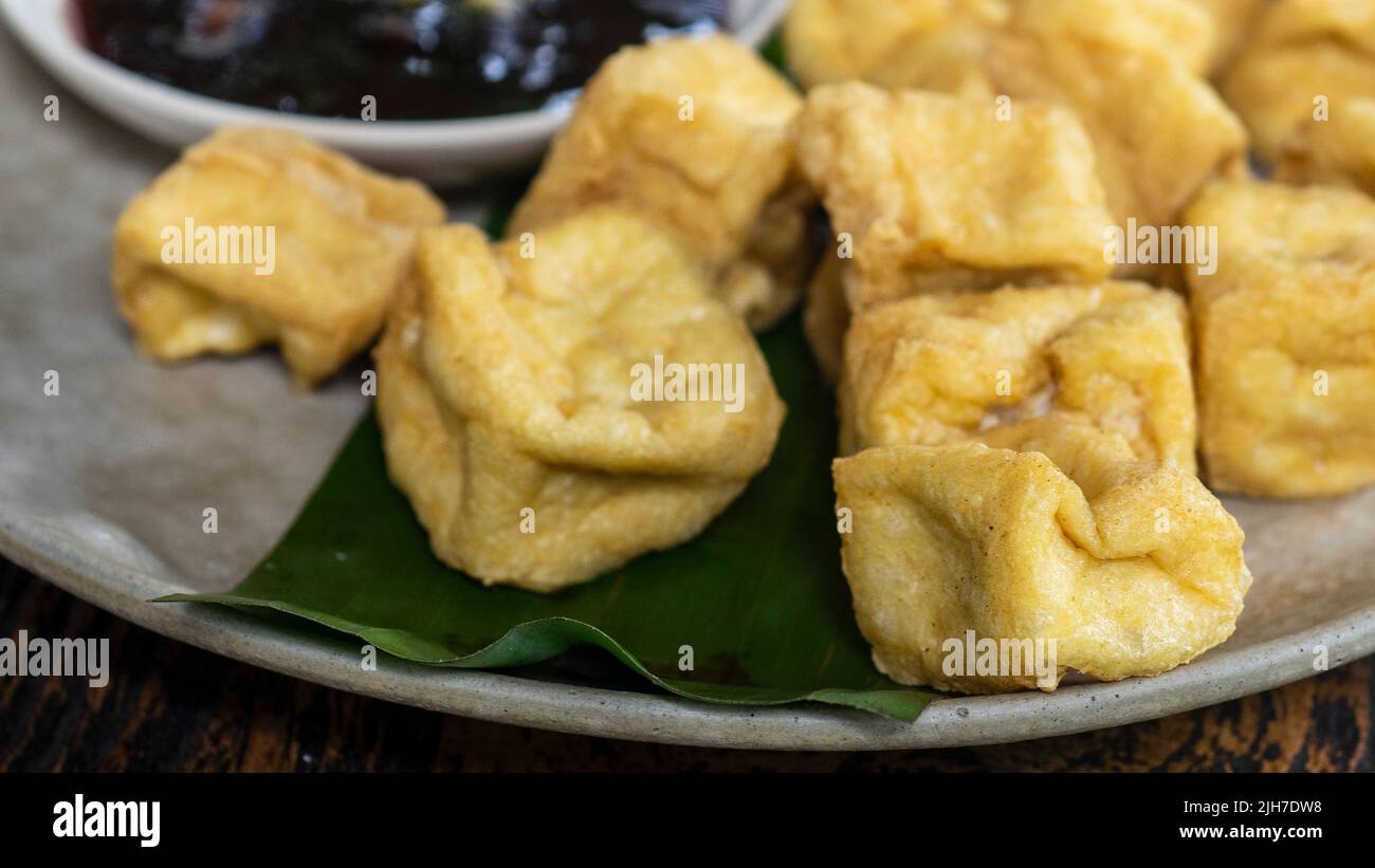Tahu Goreng is popular street food of deep fried bean curd from