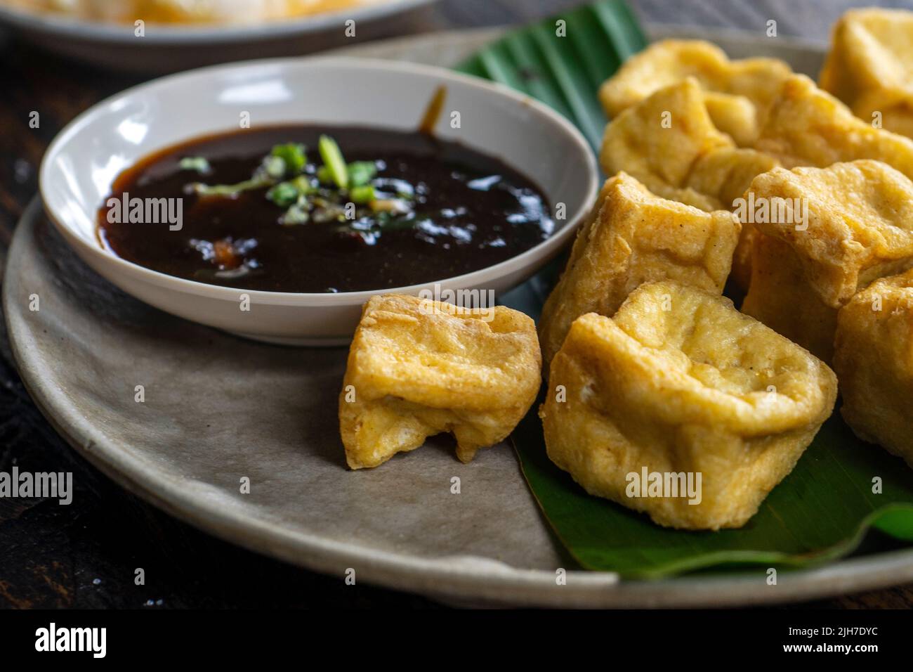 Tahu Goreng is popular street food of deep fried bean curd from Indonesia Stock Photo